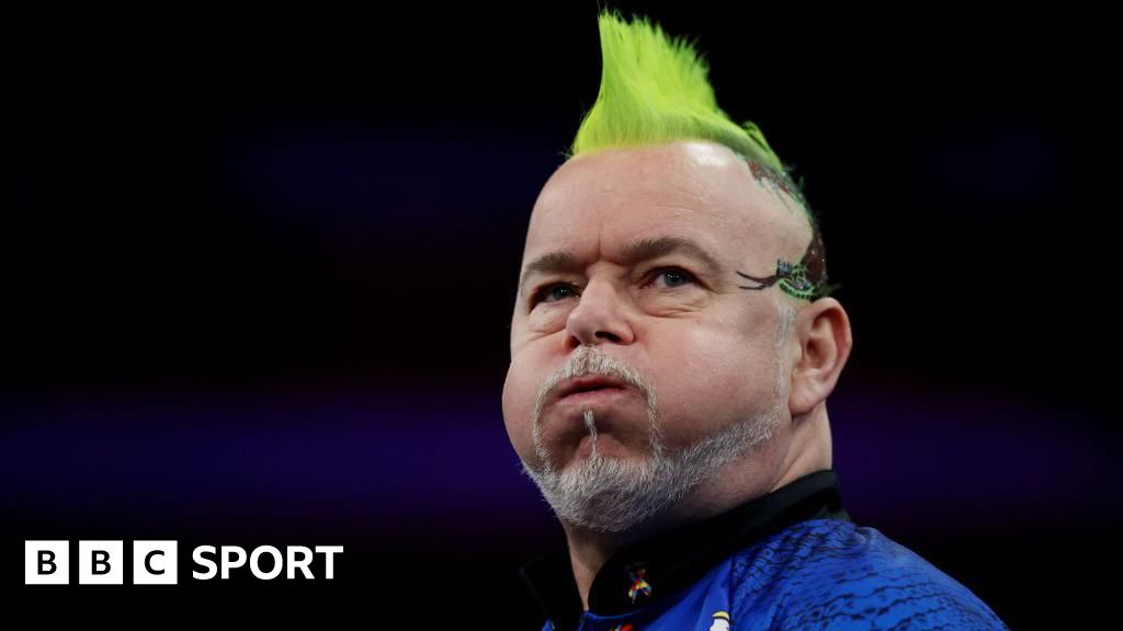 World Matchplay Darts: Peter Wright and Dave Chisnall lose in first round