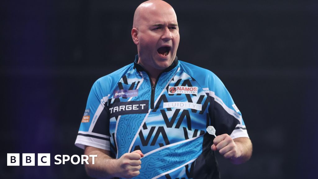 Cross beats Wright to reach Grand Slam of Darts last 16