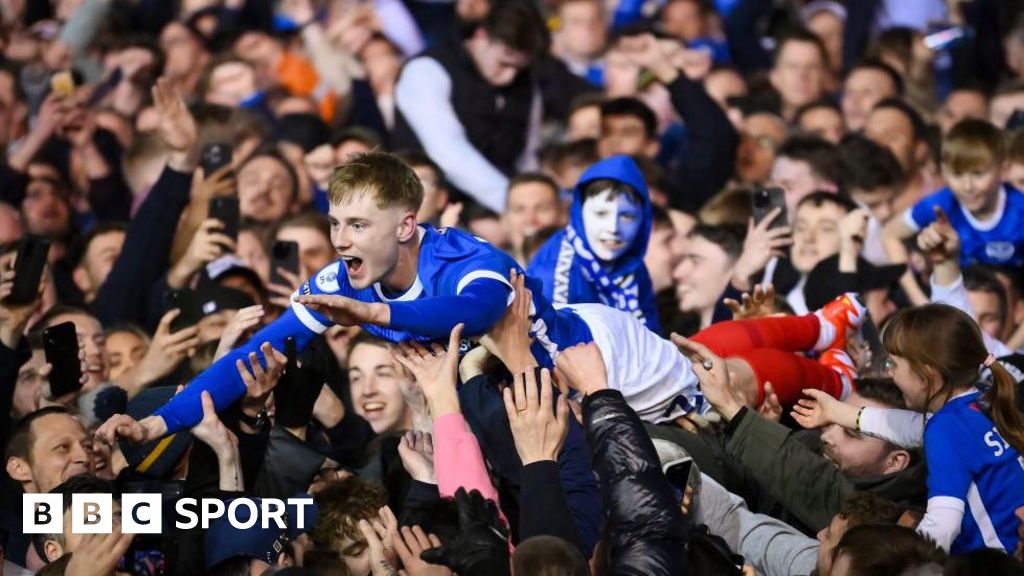 Portsmouth FC: Club charged by FA after pitch invasion