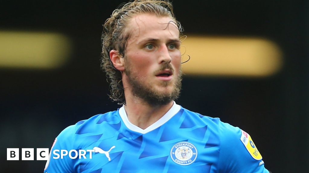 Joe Lewis AFC Wimbledon sign Stockport County defender on seasonlong