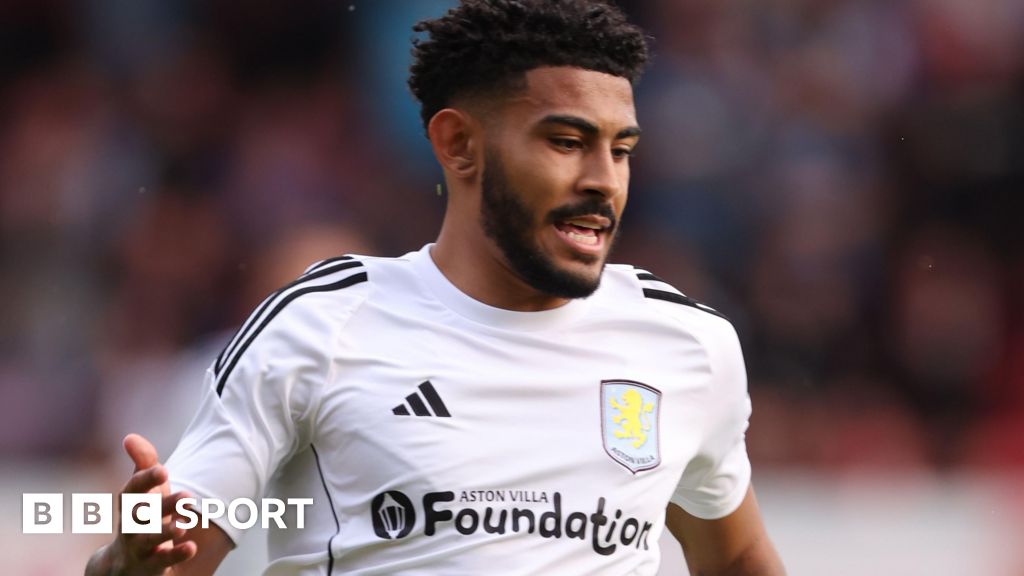 Aston Villa sign Grant