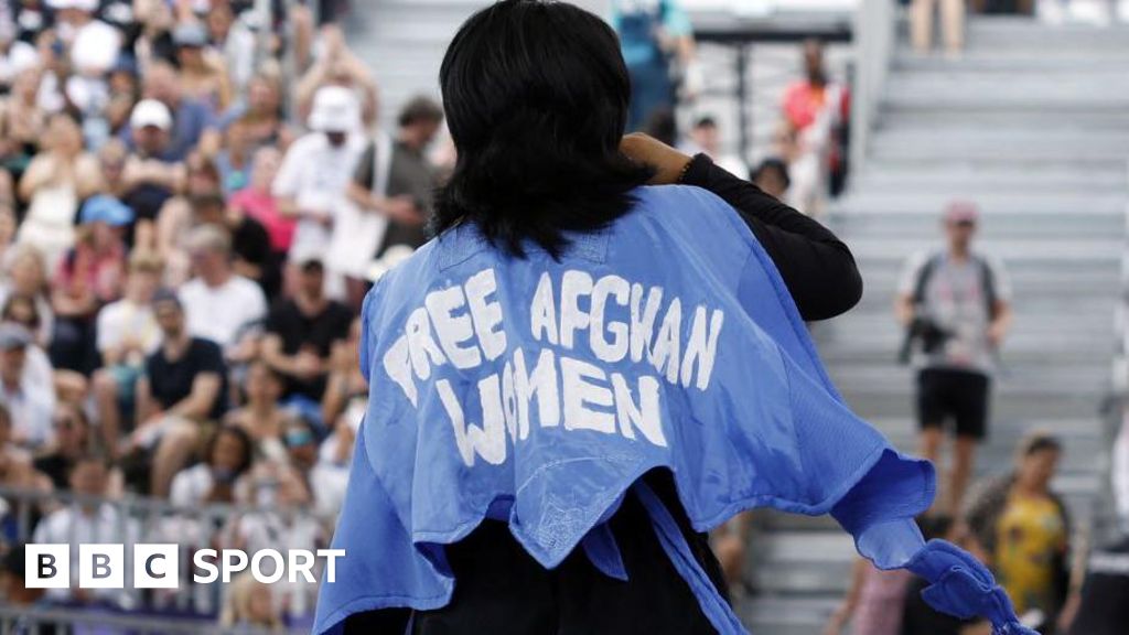 Olympic breaking news: Refugee B-girl Talash wears slogan at Games