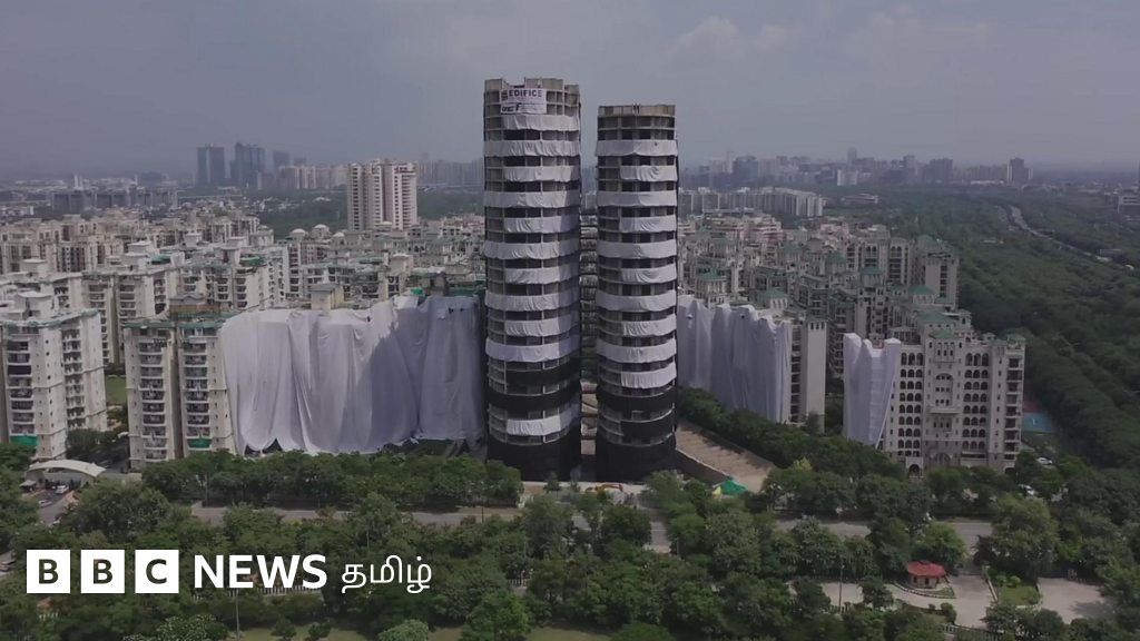 தரைமட்டமாகும் இரட்டைக் கோபுரம்: 12 நொடிகளில் தரைமட்டமாகும் 320 அடி உயர கட்டடம்; காரணம் என்ன?