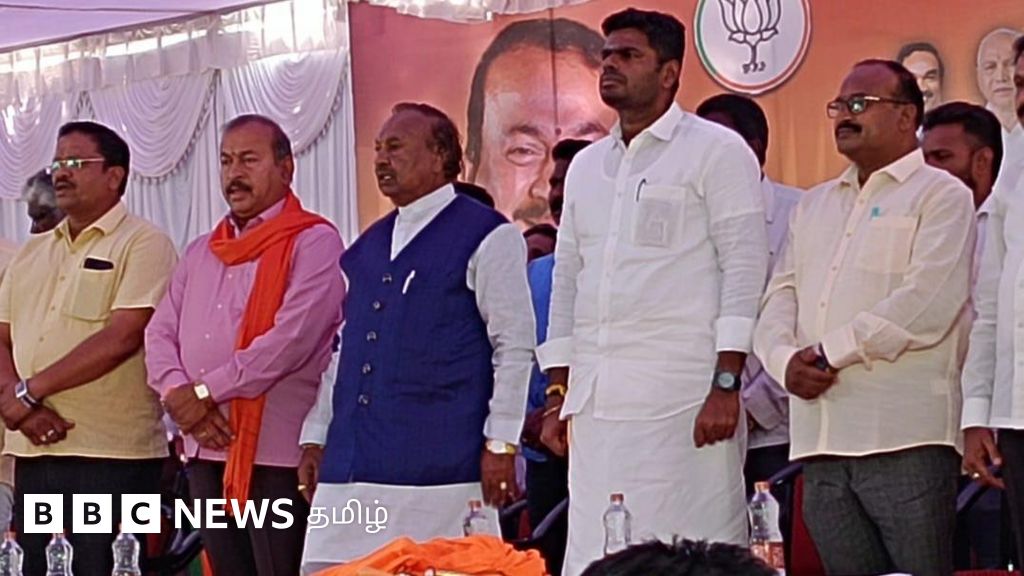 கர்நாடகாவில் பாஜக கூட்டத்தில் பாதியில் நிறுத்தப்பட்ட தமிழ்த் தாய் வாழ்த்து- தமிழக கட்சிகள் கண்டனம்