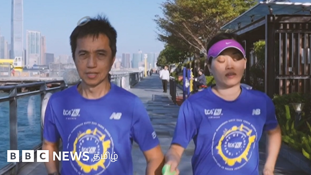 ஹாங்காங்கை கலக்கும் பார்வை மாற்றுத்திறனாளி மாரத்தான் பெண்; கணவர் உதவியுடன் சாதனை ஓட்டம்