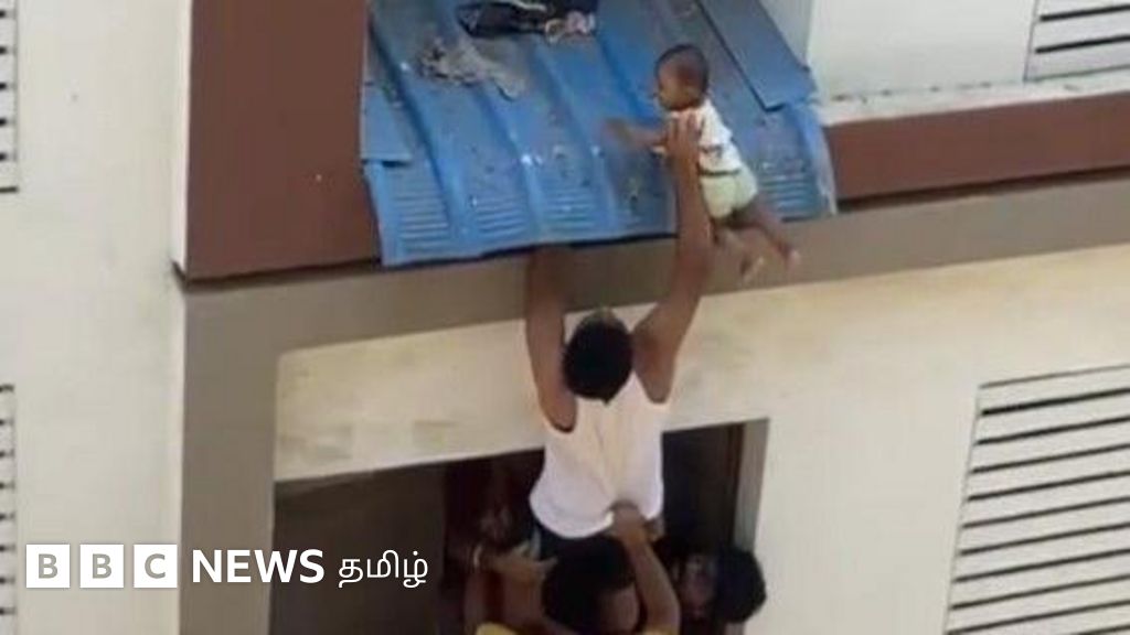நான்காவது மாடியிலிருந்து தவறி முதல் மாடியில் விழுந்த குழந்தை மீட்கப்பட்ட காட்சி