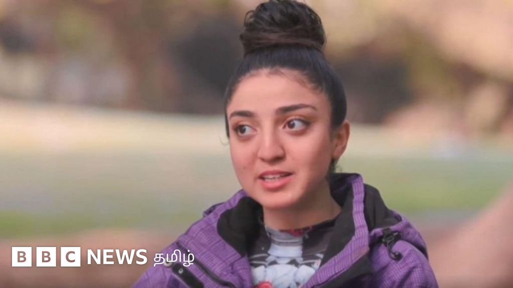 தலைமுடியில் அந்தரத்தில் தொங்கி இளம்பெண் சாகசம்