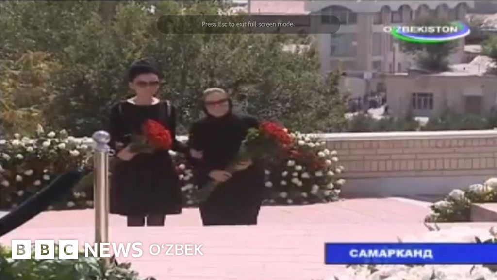 Каримов оиласи унинг қабри олдида - BBC News O'zbek