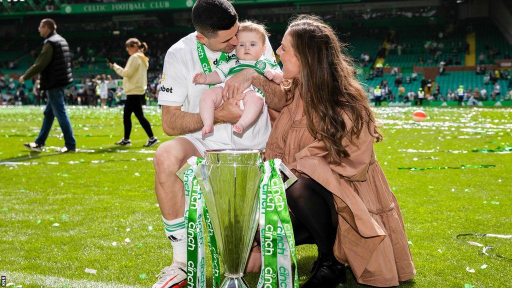 Tom Rogic and his wife celebrate with Celtic