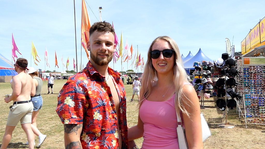 A couple at the Isle of Wight Festival 2022
