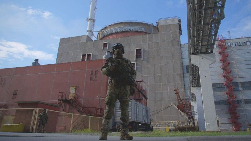 A Russian serviceman stands guard at Zaporizhzhia Nuclear Power Station in Energodar on May 1, 2022 (picture was taken during a media trip organised by the Russian army)