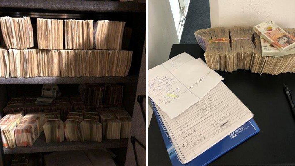 Money and a ledger book found by the police when they arrested the gang.