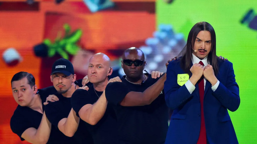 Austria's JJ celebrates with the trophy of the winner of the 69th Eurovision Song Contest