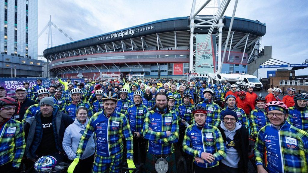 People taking part in the ride in front of the Principality stadium