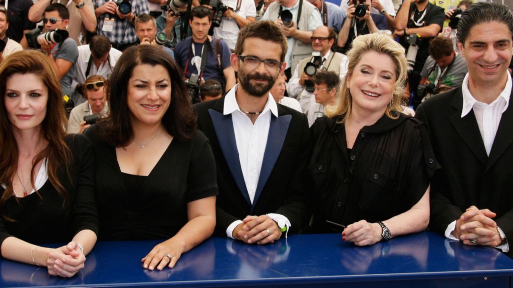 (Left to right) Actress Chiara Mastroianni and comics artists/filmmakers Marjane Satrapi and Vincent Paronnaud, alongside actors Catherine Deneuve and Simon Abkarian at the Cannes Film Festival in 2007