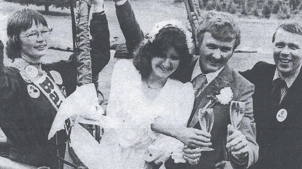 Chenube Roy in a balloon with a newlywed couple