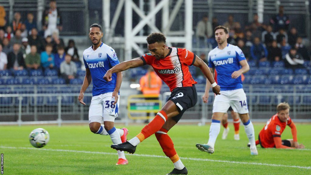 Jacob Brown scores for Luton against Gillingham at Kenilworth Road in the second round of the Carabao Cup