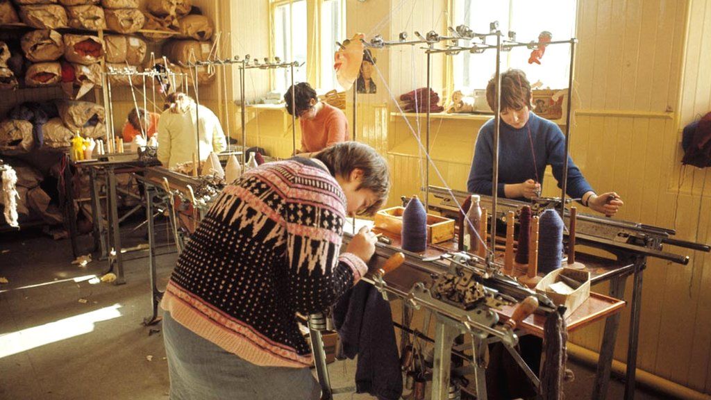 Various women operate knitting machines making Fair Isle knitwear on one of the Shetland Islands in 1970.