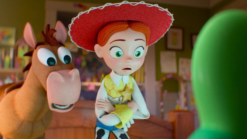 Jessie and Bullseye looking at a green tablet screen in Toy Story 5