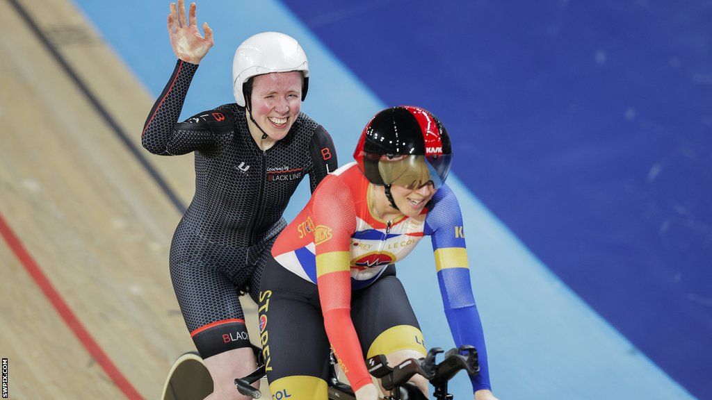 Lora Fachie and Corrine Hall in celebratory mood on the bike at the National Track Championship