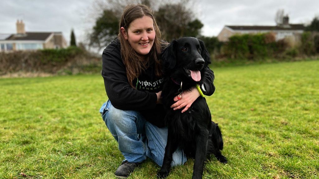 Beth Ponsford with her assistance dog Falcon