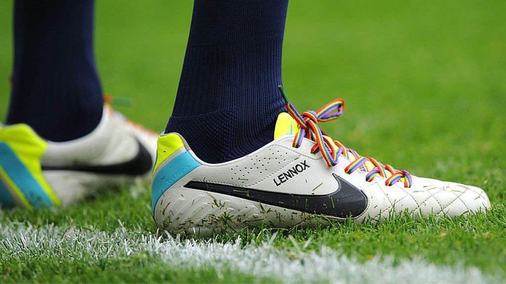 A player wears rainbow laces to support a campaign against homophobia in football