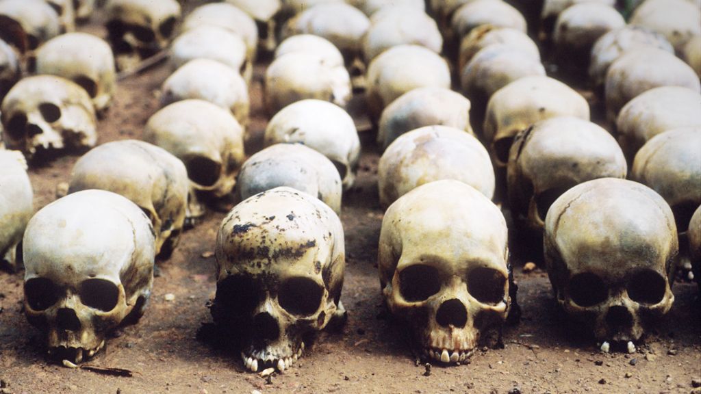 Skulls lined up outside a chapel in Rwanda - as authorities tried to determine the extent of the genocide, 1994