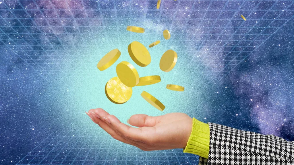 Gold coins shown falling into someone's outstretched hand.