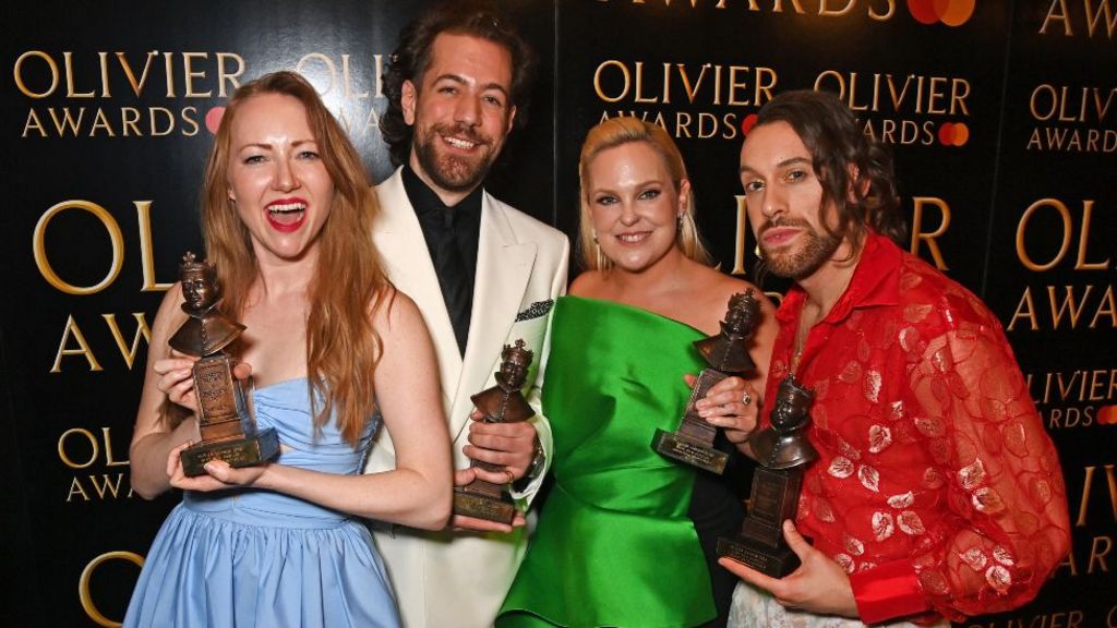 Natasha Hodgson, Felix Hagan, Zoe Roberts and David Cumming, winners of the Best New Musical award for "Operation Mincemeat", pose backstage during The Olivier Awards 2024 at the Royal Albert Hall on April 14, 2024 in London, England