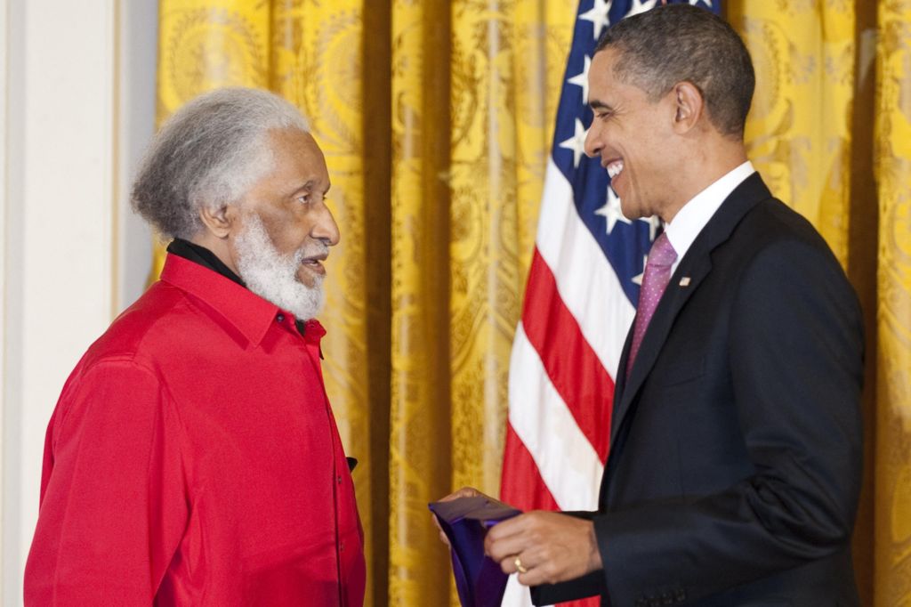US President Barack Obama (R) awards the 2010 National Medal of Arts to Grammy-winning American jazz tenor Sonny Rollins during a ceremony at the White House in Washington, DC, March 2, 2011
