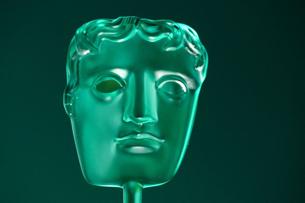 A green Bafta Rising Star Award trophy - of a generic face 