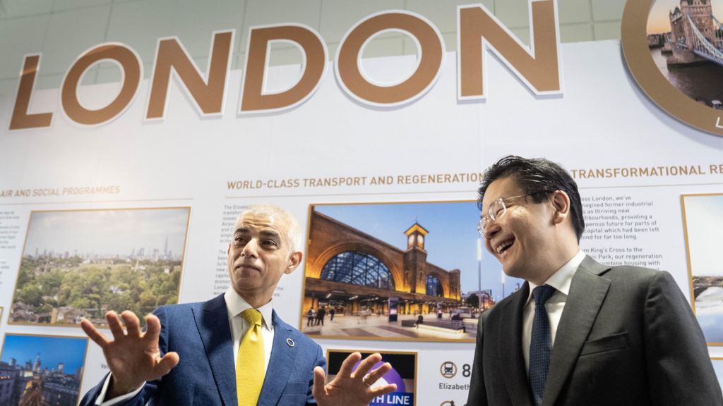 Mayor of London Sadiq Khan (left) chats with the Prime Minister of Singapore, Lawrence Wong