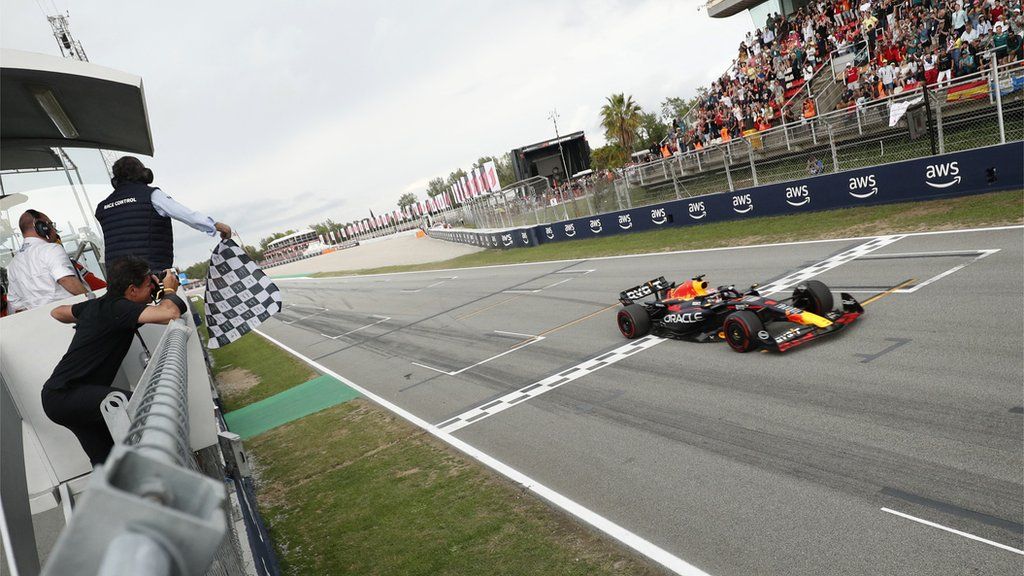 Max Verstappen takes the chequered flag at the Spanish GP