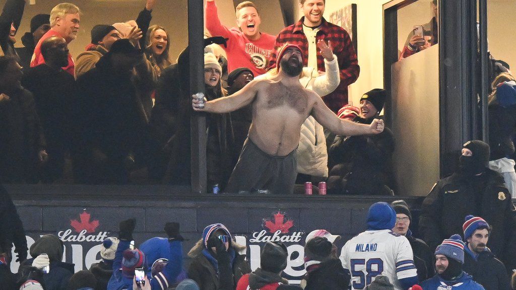Jason Kelce celebrating shirtless after a Kansas City Chiefs touchdown