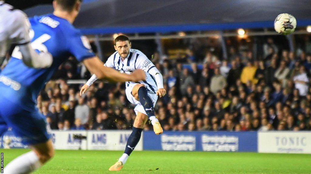 West Brom's John Swift takes a shot at goal against Birmingham City