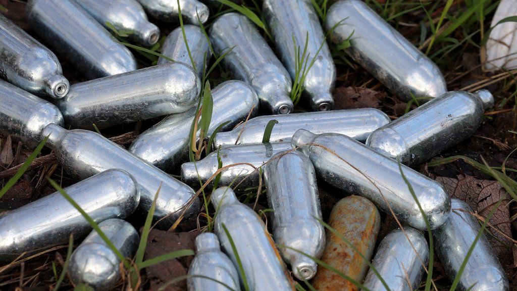 Discarded nitrous oxide cylinders