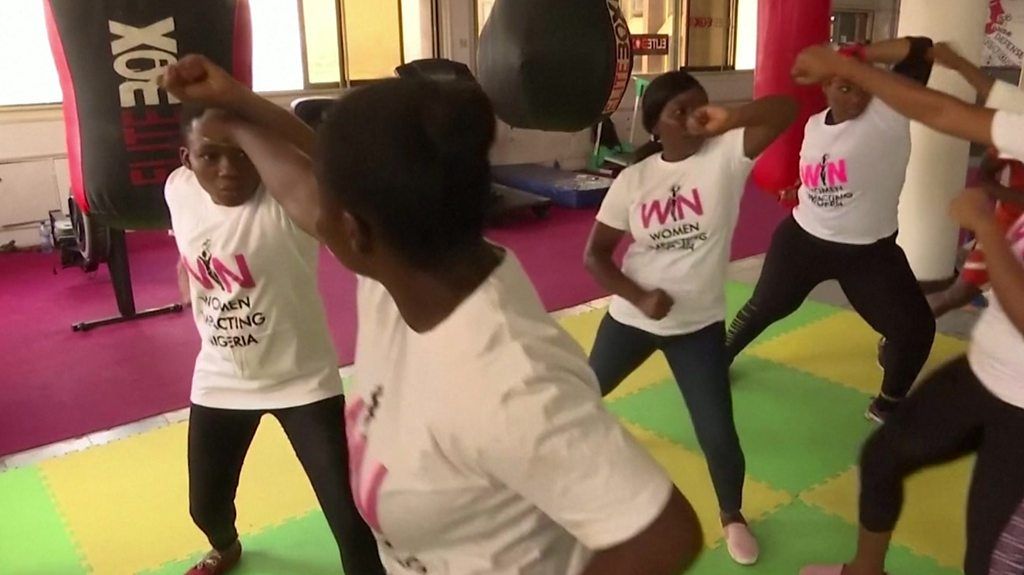 Women learning self-defence