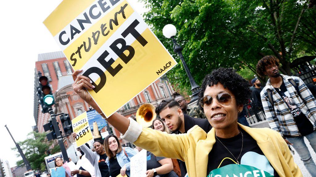 Student loan borrowers gather near the White House
