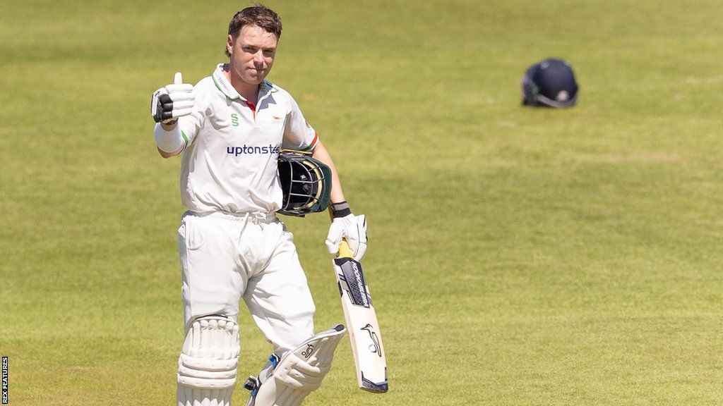 Marcus Harris gives a thumbs up to the dressing room after reaching a century for Leicestershire in 2021