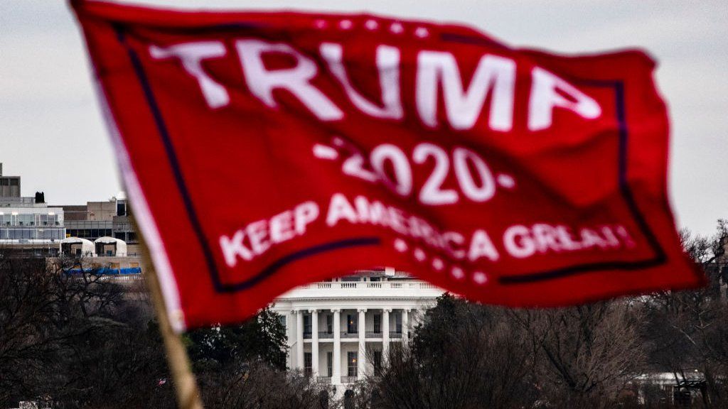 A trump flag near the White House