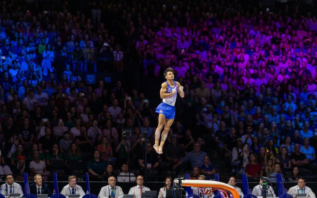 Simone Biles and Jake Jarman enjoy golden day at world