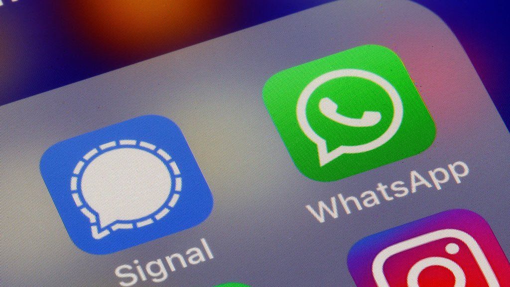 A screen shot of signal and whatsapp encrypted messaging apps