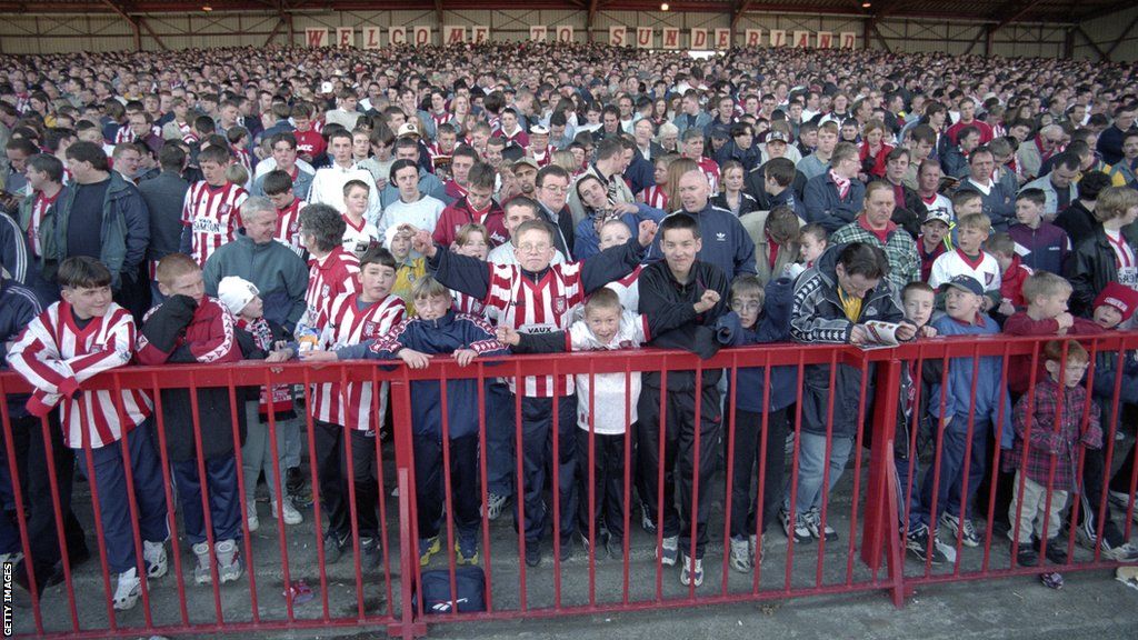 Sunderland fans stand on the old Fulwell End at Roker Park