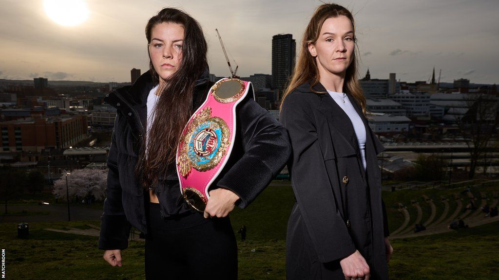 Sandy Ryan and Terri Harper stand back to back with Sheffield city skyline in the background