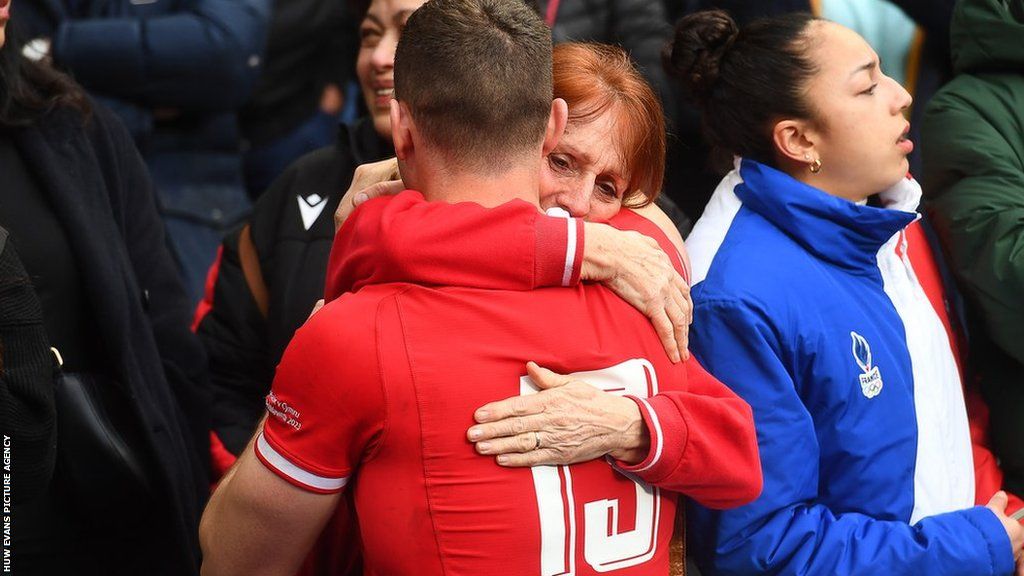 George North hugs his mother after game in Paris