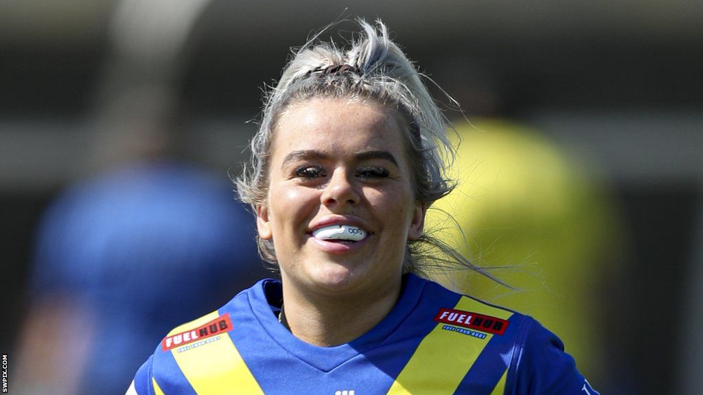 Sammy Simpson's hat-trick against Huddersfield Giants helped Warrington Wolves to their first league win of the season