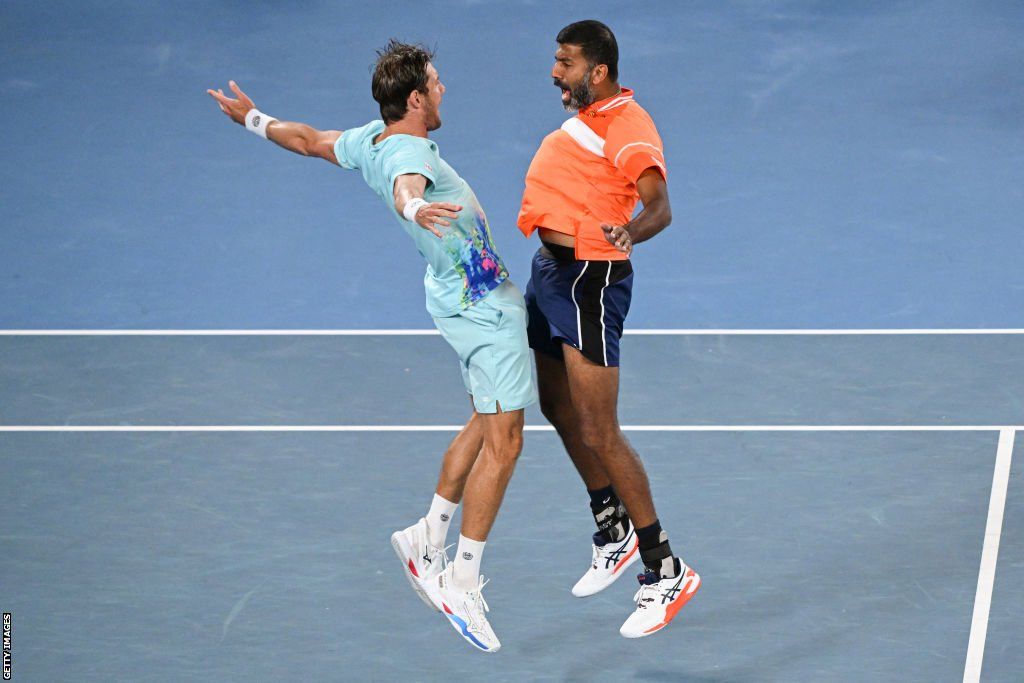 Matthew Ebden and Rohan Bopanna jump to celebrate their Australian Open win