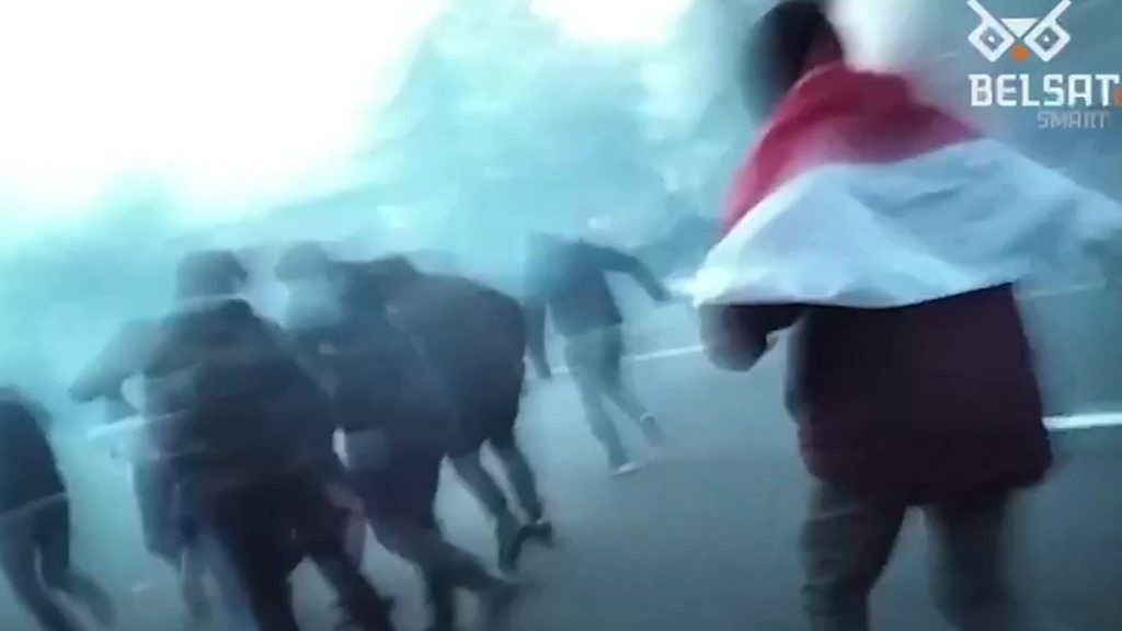 Protesters flee stun grenades