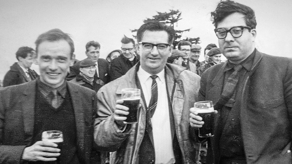 Architects John Cowell (l) and Isi Metzstein (r) - and project manager Stan Blair in the centre - celebrate at the "topping out" ceremony in 1965