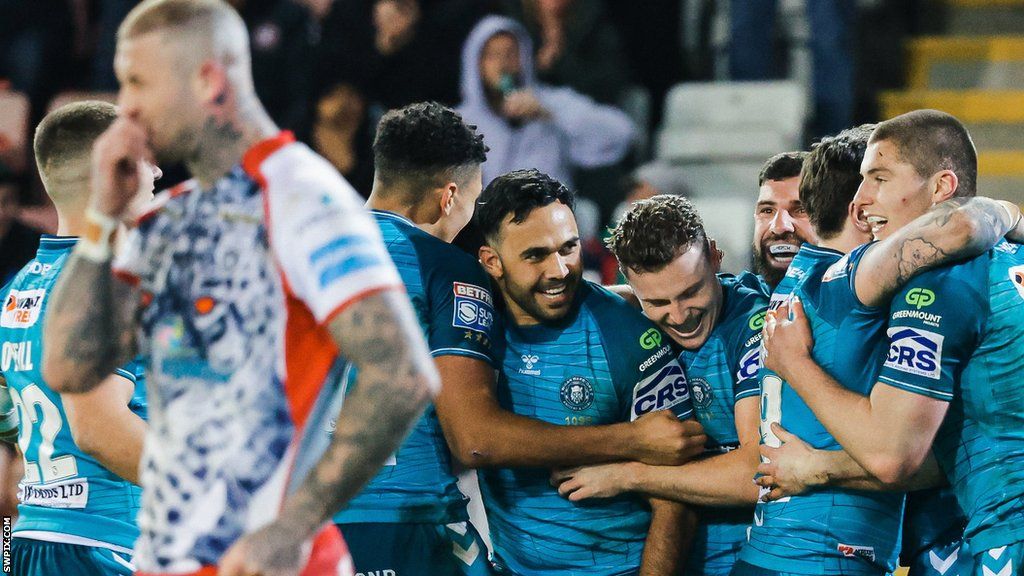 Jai Field and Bevan French were key, as was Harry Smith as Wigan roared to victory. They celebrate with Brad O'Neil, Ethan Havard and Kai Pearce-Paul as Leigh's Zak Hardaker stands dejected.